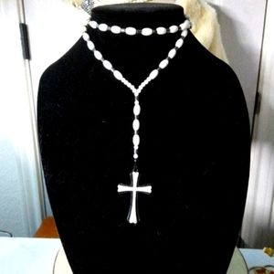 Black and white beaded necklace with black and white cross